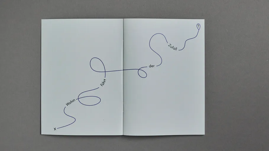 Simple line drawing on open notebook.