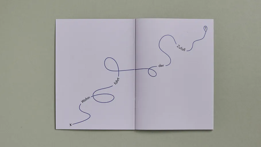 Open book with winding handwritten text line.