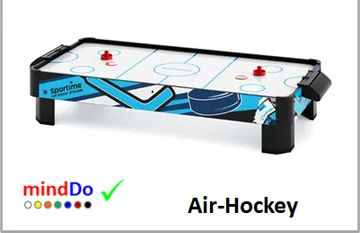 Mini air hockey table with red paddles.
