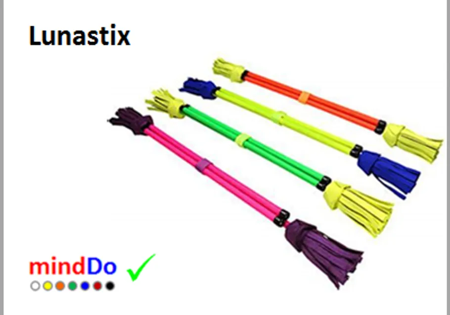 Four colorful juggling sticks on white background.