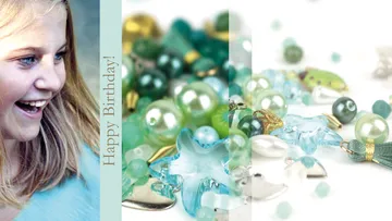Smiling girl with birthday beads background.
