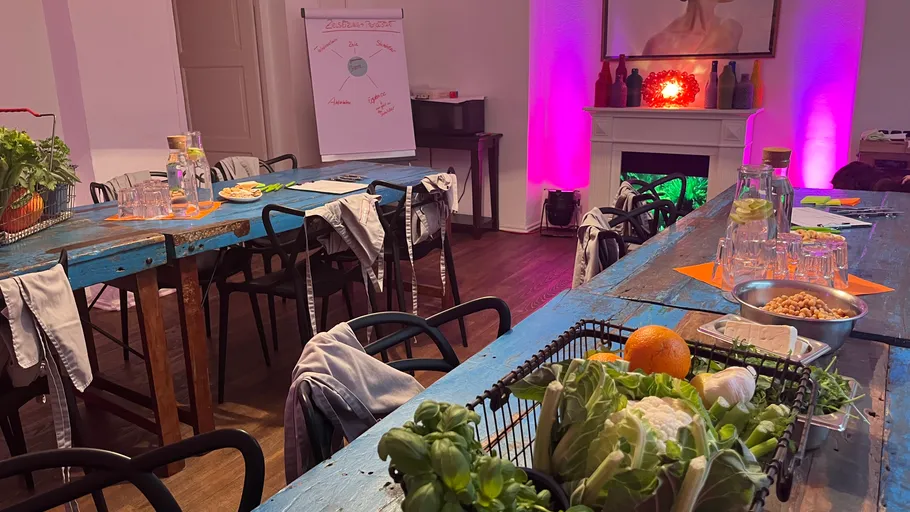 Workshop room with rustic tables and ingredients.