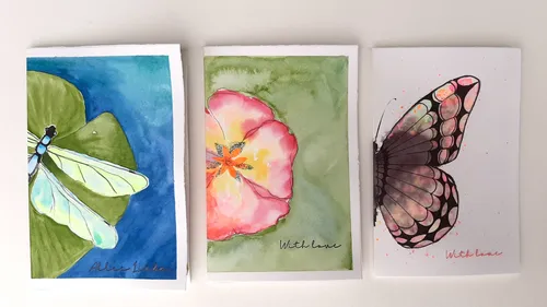 Three painted cards with flowers and insects.