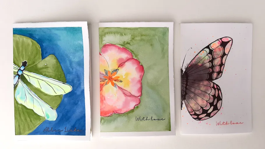 Three painted cards with flowers and insects.