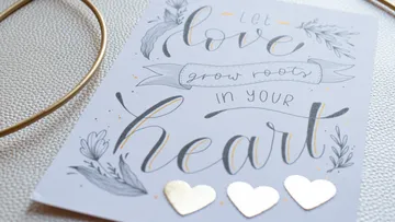 Decorative card with love-themed handwritten message.