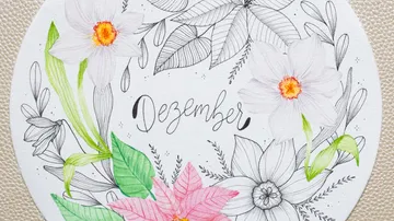 Floral illustration with 'Dezember' text centerpiece.
