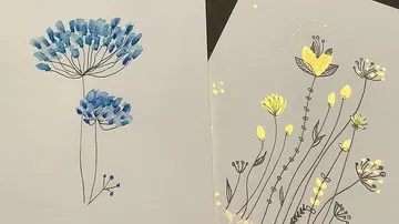 Hand-drawn floral designs on white cards.