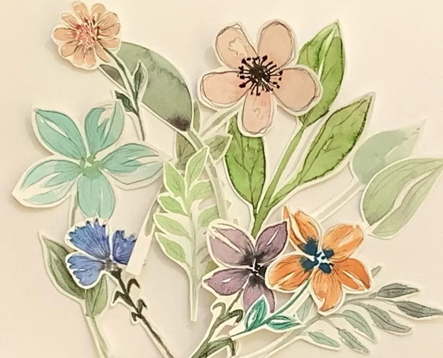 Watercolor flowers arranged on white background.