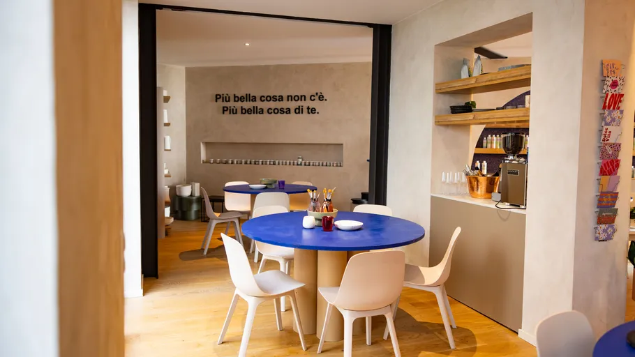 Modern restaurant interior with round tables.