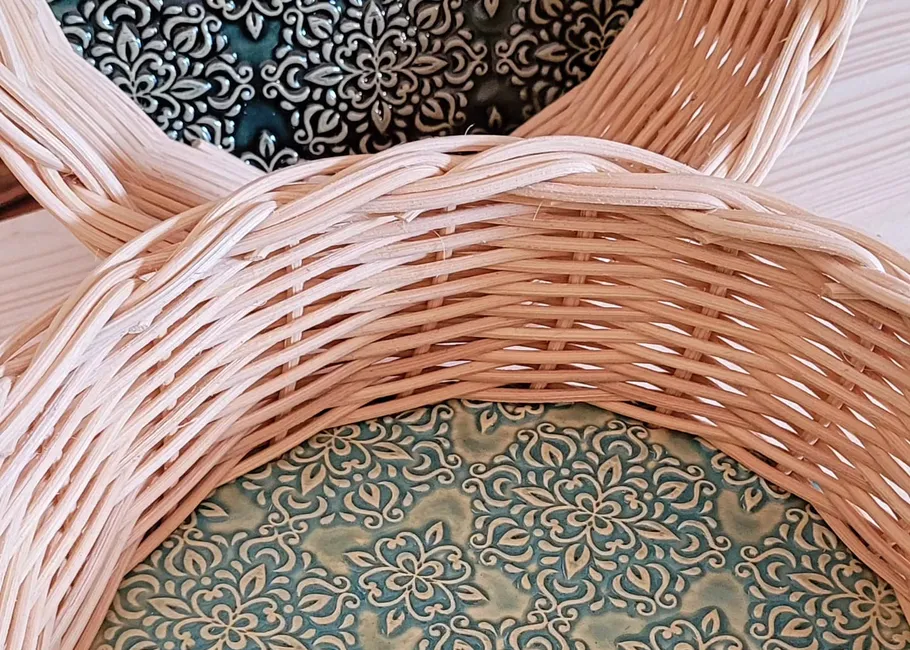Wicker baskets with decorative fabric lining.