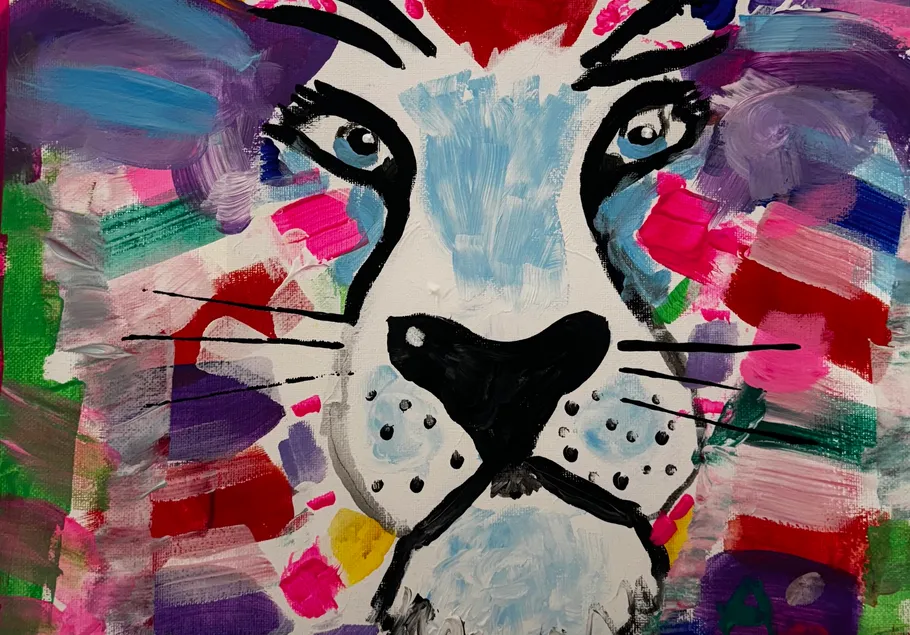 Colorful lion face painting with abstract brush strokes.