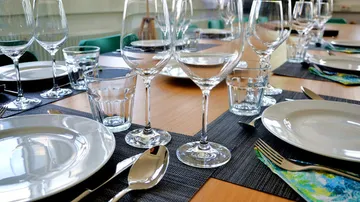 Elegant table setting with wine glasses.