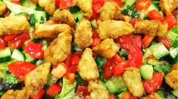 Salad with crispy chicken tenders.