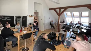 People working in a modern open office.