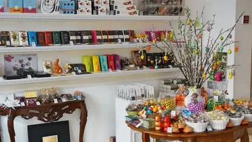 Colorful chocolates displayed in a bright store.