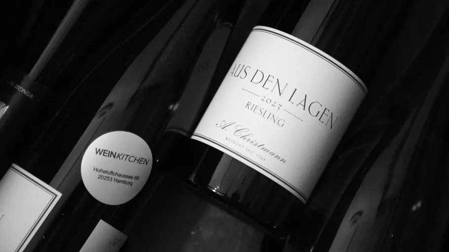 Wine bottles with Riesling label in cellar.