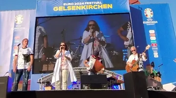 Band performing on stage at Euro 2024 festival.