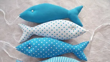 Fabric fish toys with polka dots pattern.