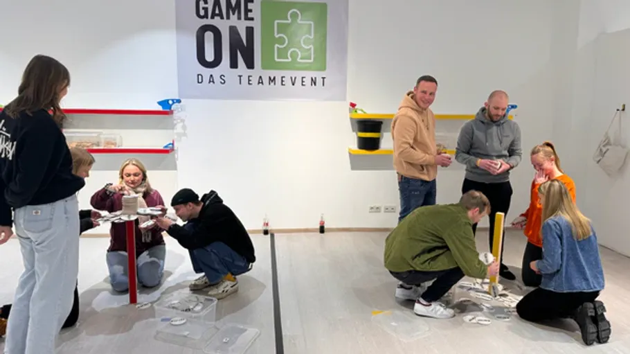 People participating in team-building activities indoors.