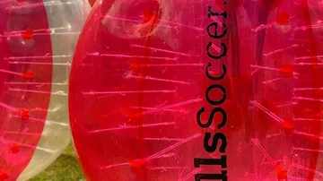 Inflatable bubble for bubble soccer outdoors.