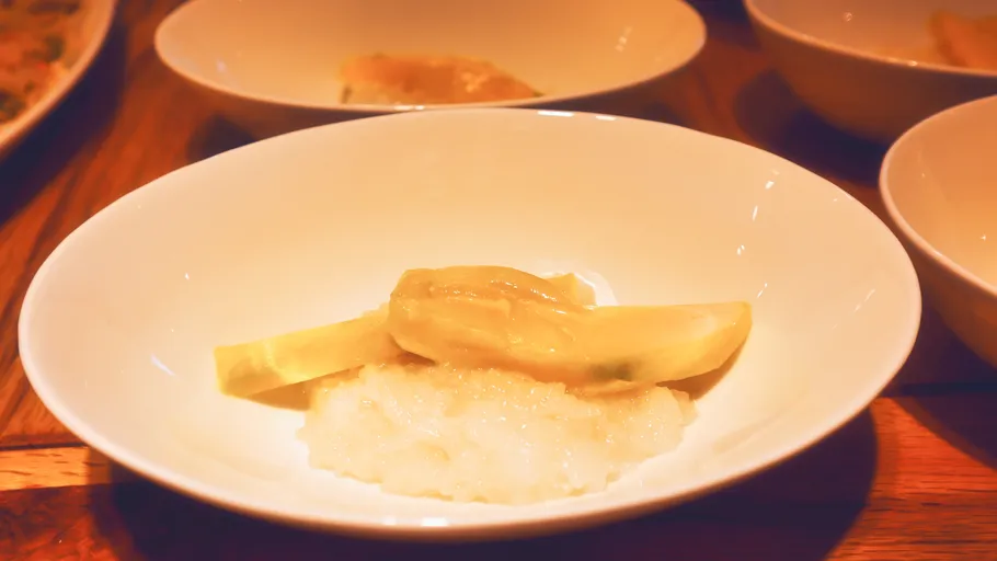 Durian on sticky rice in a bowl.