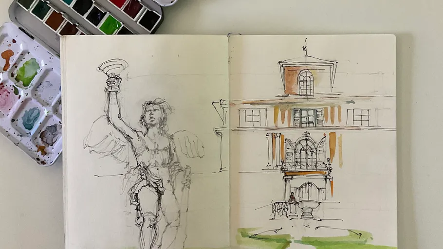 Skizzenbuch mit Statue- und Gebäudeskizzen.