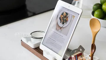 Tablet displaying recipe in kitchen setting.