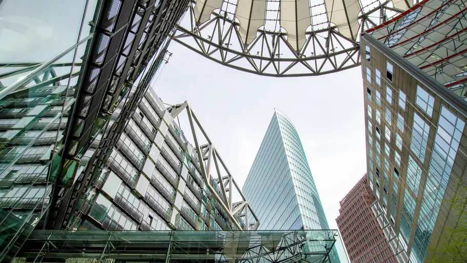 Modern buildings with glass roofs, Berlin architecture.