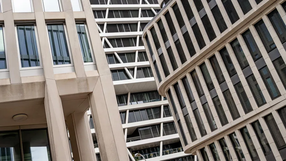 Modern buildings with geometric patterns, urban setting.