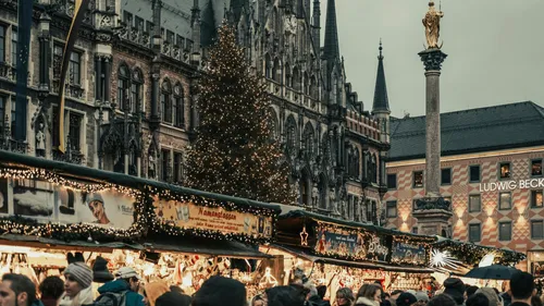 Christmas market with stalls and decorations.