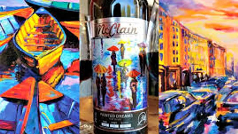 Colorful paintings and wine bottle with art label.