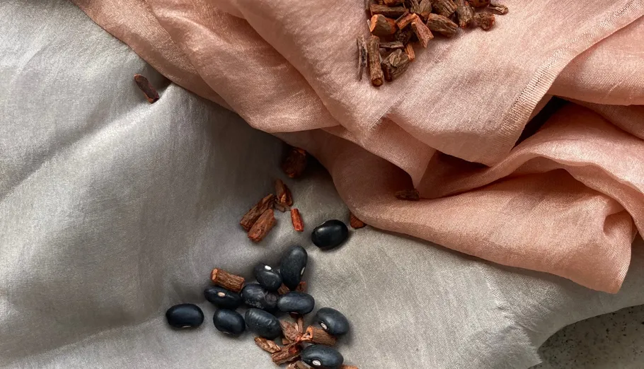 Fabric dyed with beans and wood chips.