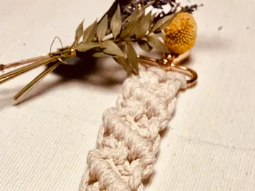 Creative keychains with dried flowers on a table