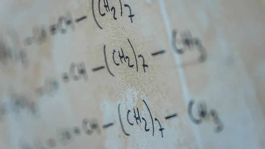 Chemical formulas written on a wall.