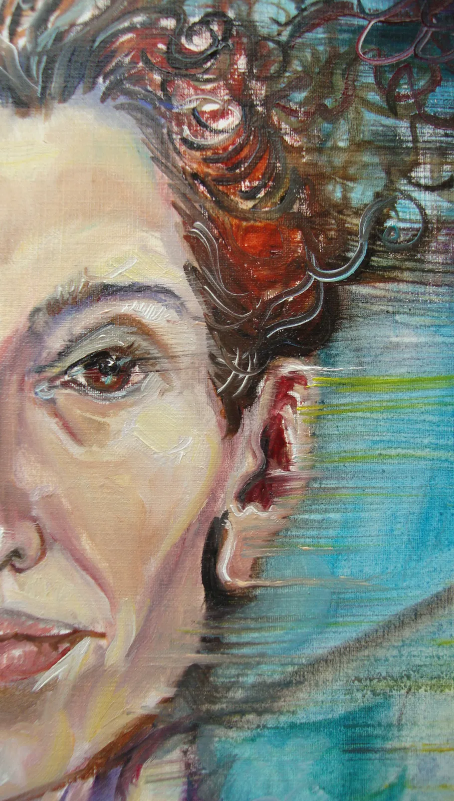 Close-up of painted face with colorful background.