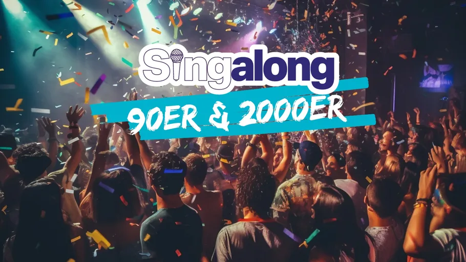 Publikum bei Konzert mit buntem Konfetti.