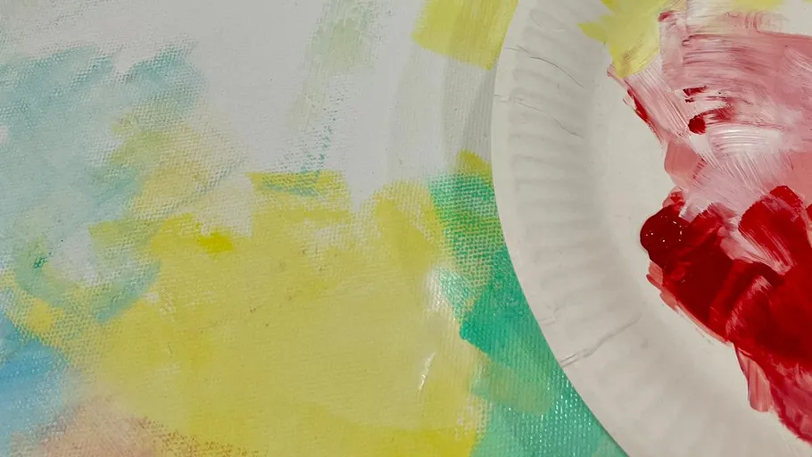 Paint palette with colorful brush strokes.