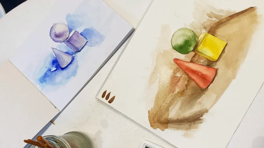 Two watercolor paintings of geometric shapes.