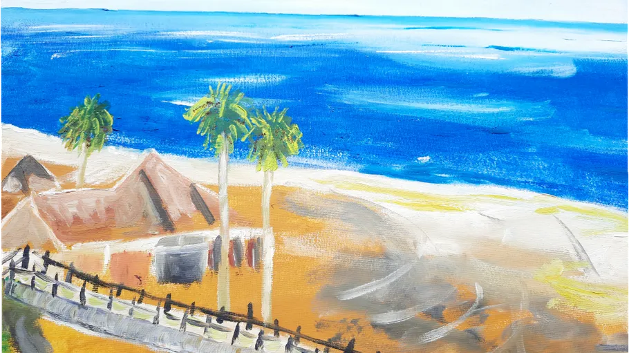 Cottages and palm trees by the ocean.