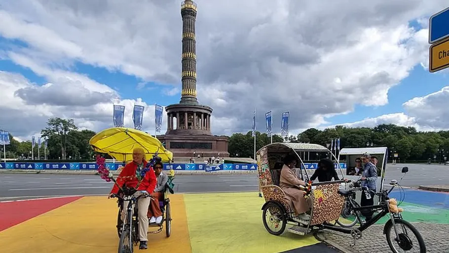 Two rickshaws near Berlin Victory Column.