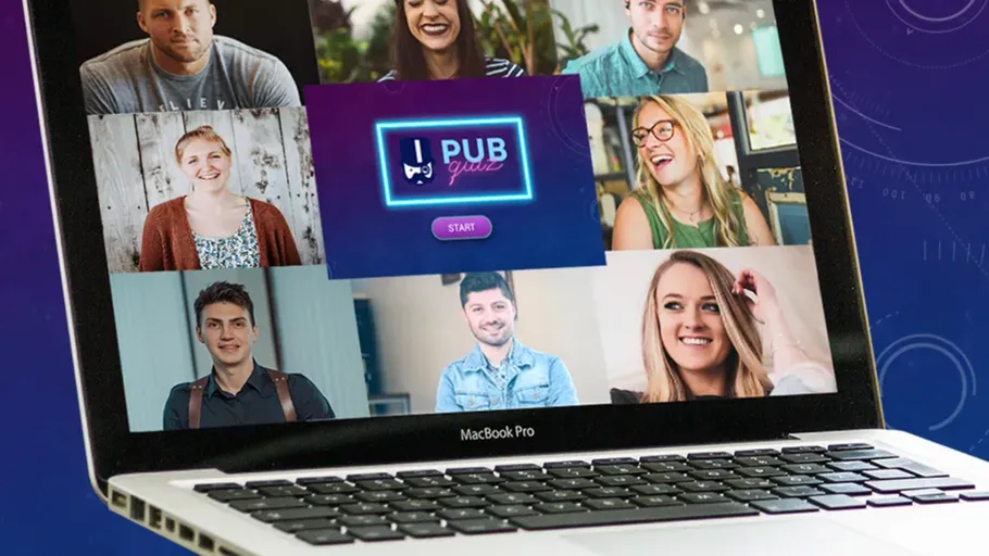 Laptop displaying video call with multiple participants.