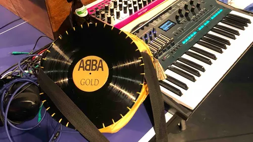 Record shaped bag on keyboard instrument.