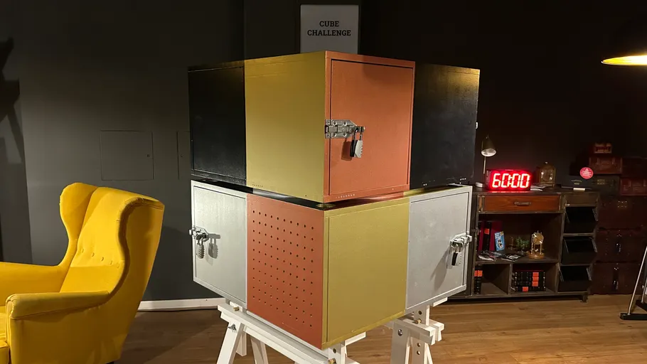 Colored cube with locks on stand in room.