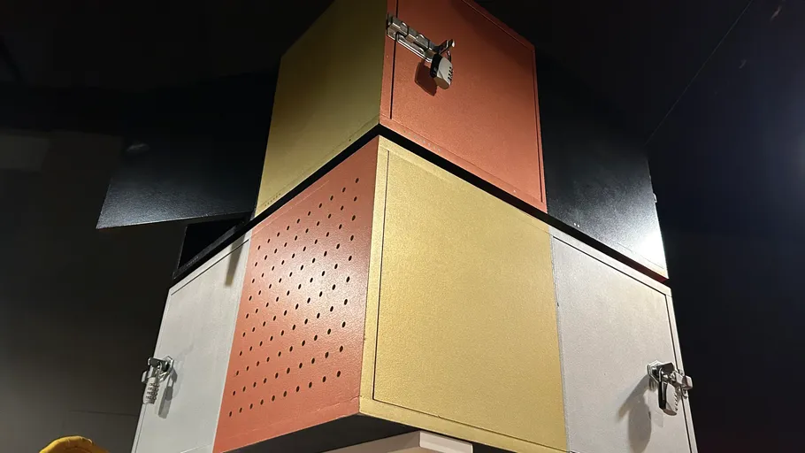 Colorful stacked lockers with metal latches.