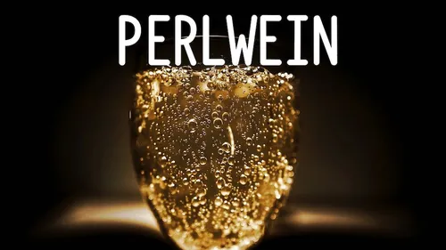 Glass of sparkling wine with bubbles.