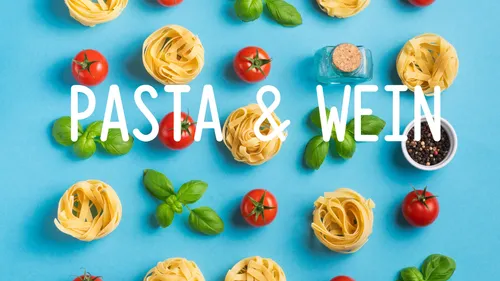 Pasta, tomatoes, basil on blue background.