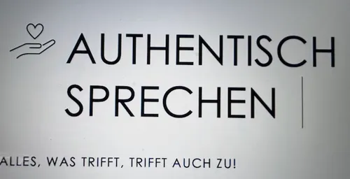 Text mit Herz- und Handillustration.