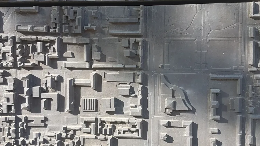 3D city map with buildings and streets.