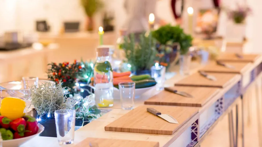 Cooking class station with chopping boards.