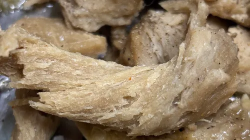 Close-up of cooked plant-based chicken alternative.